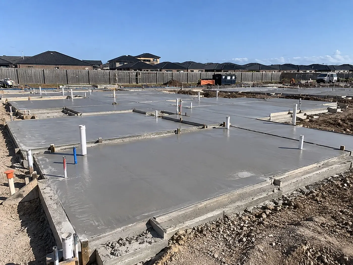 Split-level concrete slabs with set-downs on a sloping site